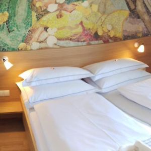 Zimmer mit Queensize-Bett
